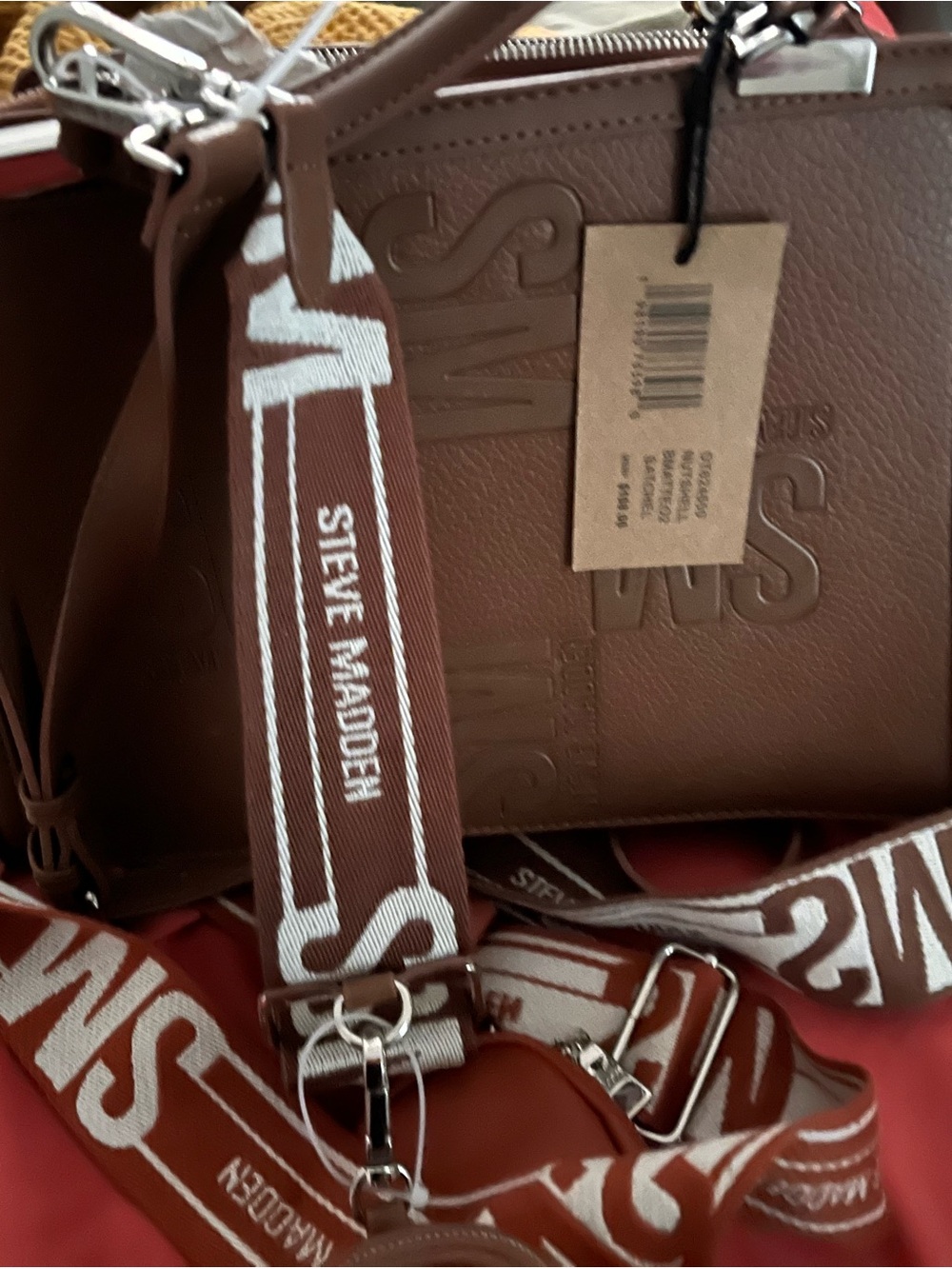 Steve Madden Brown Embossed Logo Crossbody Bag with Branded Strap